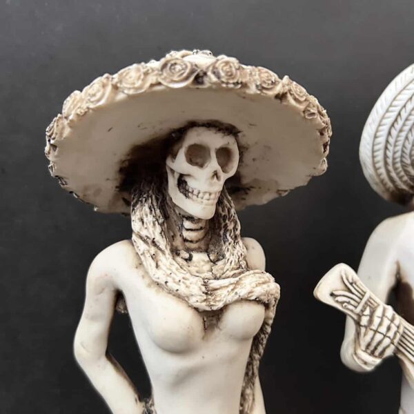 13” Catrin y Catrina hand carved bone statues - Image 9